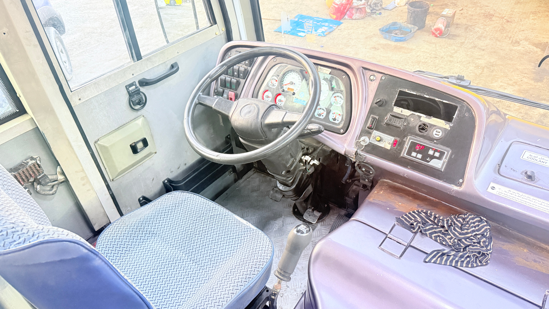 JMT-067 — driver cockpit with dual instrument cluster