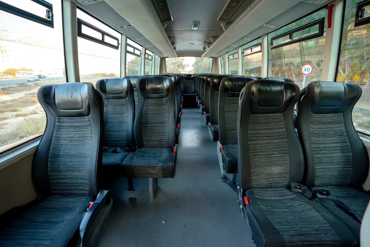 Interior — high-back fabric seats with belts